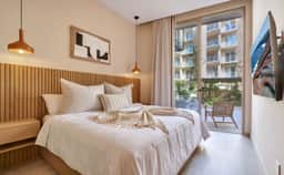 Breezy 2BR Ground-Level Hideaway | Pool, Parking & Great Location