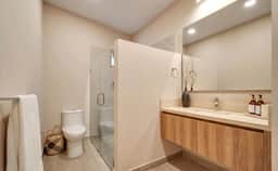 Breezy 2BR Ground-Level Hideaway | Pool, Parking & Great Location