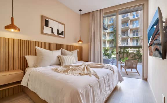 Breezy 2BR Ground-Level Hideaway | Pool, Parking & Great Location