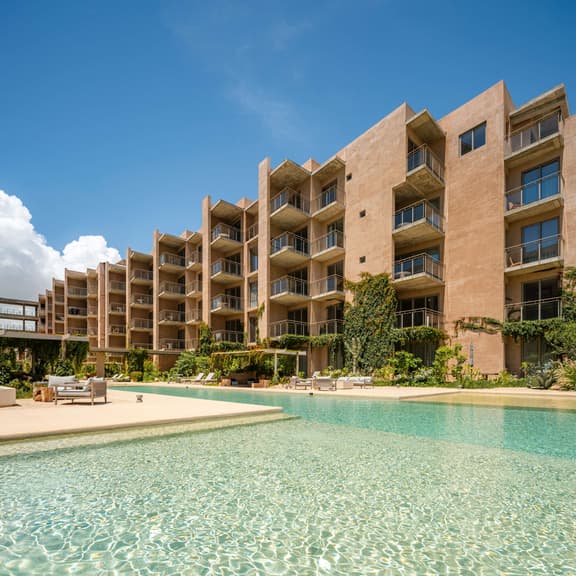Breezy 2BR Ground-Level Hideaway | Pool, Parking & Great Location